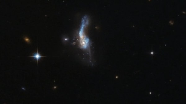 Коинотда кутилмаган ҳолда янги улкан галактика топилди